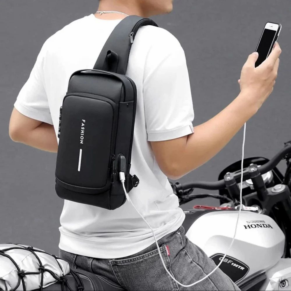 “Premium Waterproof Travel Sling Bag | Anti-Theft Crossbody Bag with USB Charging Port”